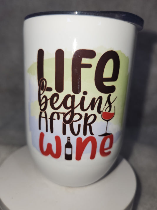 12 Oz stainless steel wine tumbler. It says life begins after wine wt3