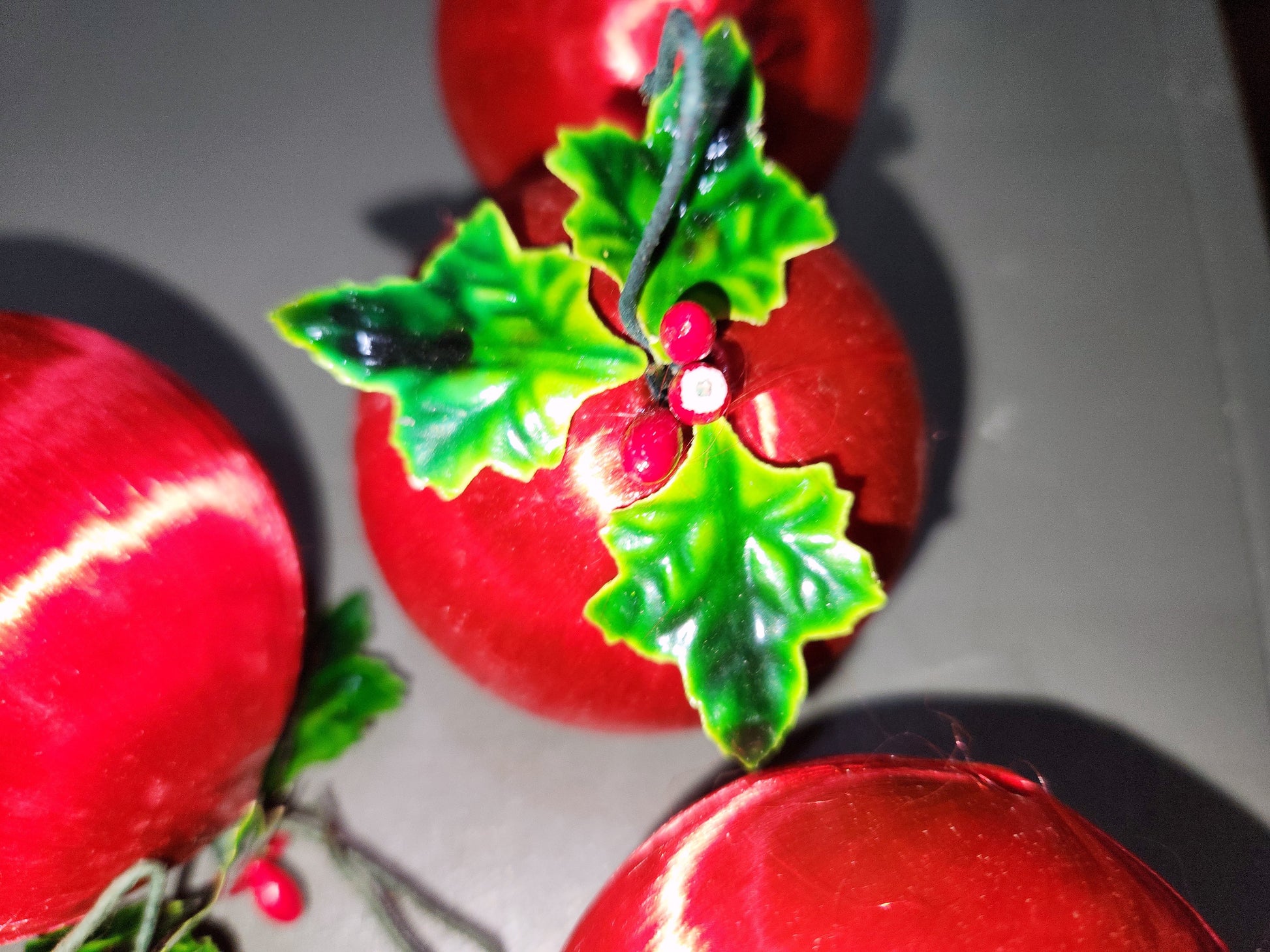 Vintage Red Satin Spun Silk Christmas Ornament 2" Ball With Green Holly Leaf and Green Metal Hanger